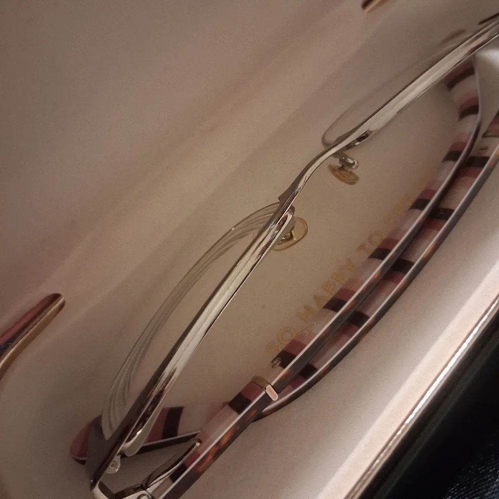 Kate Spade Rectangle Frames Tortise Shell With Pink and Black Striped Frames.